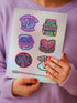 Feminist sticker sheet measuring 9.8x14 inches featuring 6 kiss-cut vinyl stickers with matte finish. Includes designs: “Consent or Coffin” (4.1x4), “Girls Just Wanna Have Fundamental Rights” (3.5x4.1), “Hex the System” (3.6x3.7), “Romanticize Your Rage” (3.7x3.3), “Tell Me to Smile and I’ll Scream” (3.6x3.6), and “Soft But Not Sorry” (~3.3"). Weather-resistant, semi-permanent adhesive, ideal for laptops, water bottles, and journals.